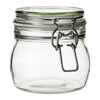 a glass jar that is on a table