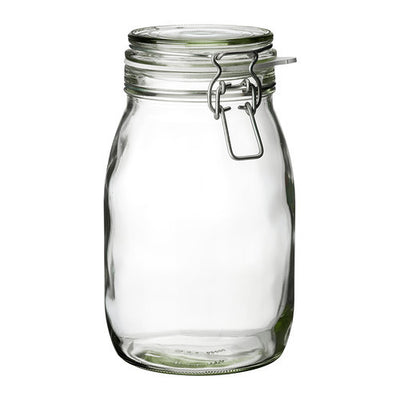 a glass jar filled with water on a table